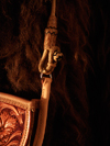 Cowgirl Cross-body Handbag by Keith Valley.  This bag is constructed with butter soft chap skin with overlaid tooling leather for the carved art.  Flowing Floral pattern on the face and a geometric stamp pattern on the back.  Handle Option either with leather strap hanger or hand braided rawhide horse bridle hanger for the shoulder strap.