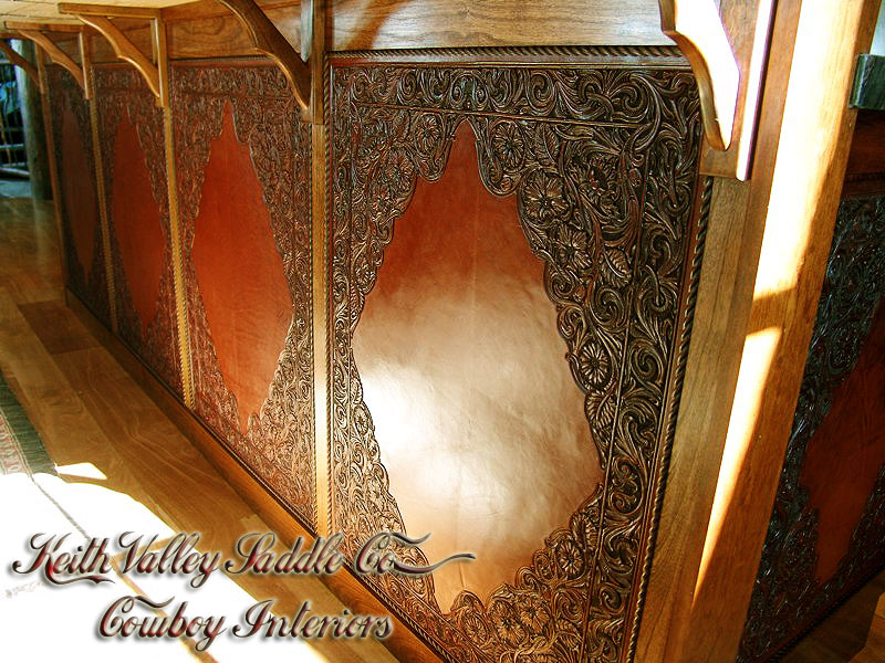 Every drawer and cabinet face designed with custom cowboy interior designs that are deeply hand carved, with greatest care, on the leather. Each piece has the eye appeal and a sense of living flow. All original cowboy art designs by Keith Valley