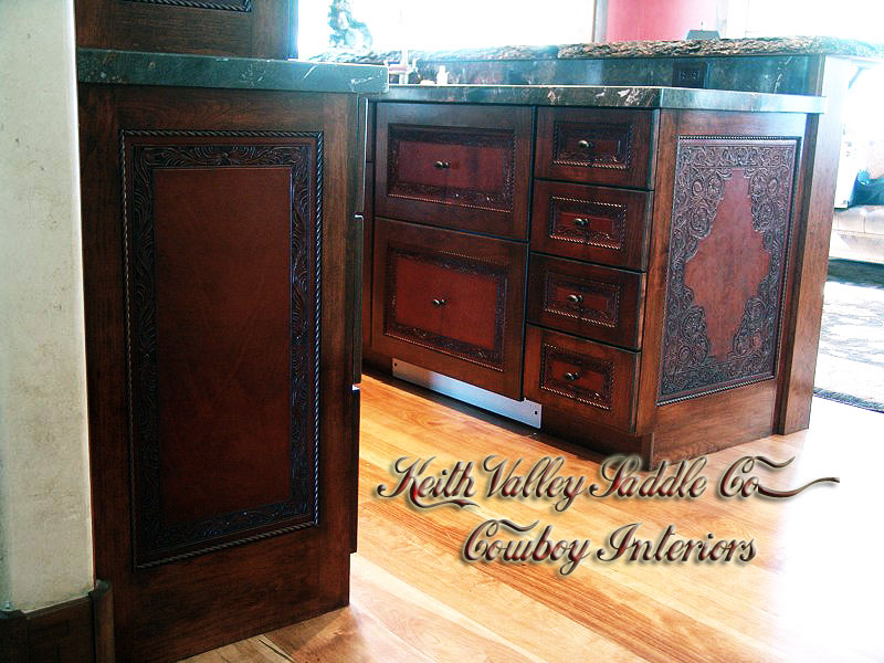 Every drawer and cabinet face designed with custom cowboy interior designs that are deeply hand carved, with greatest care, on the leather. Each piece has the eye appeal and a sense of living flow. All original cowboy art designs by Keith Valley